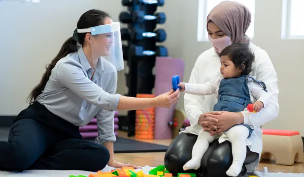 Occupational Therapy Assistant delivers culturally sensitive healthcare treatment to woman and her daughter.