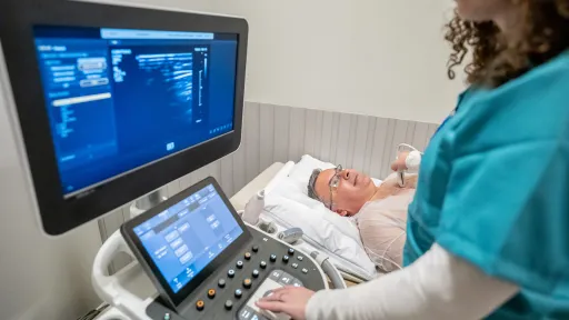 An elderly patient undergoes a contrast-enhanced ultrasound to detect potentially diseased areas of tissue.