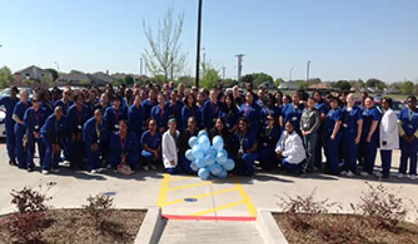 Concorde's grand prairie students gather to raise autism awareness.