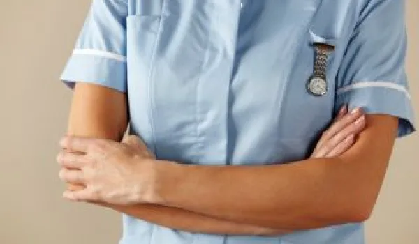 nurse with lapel watch