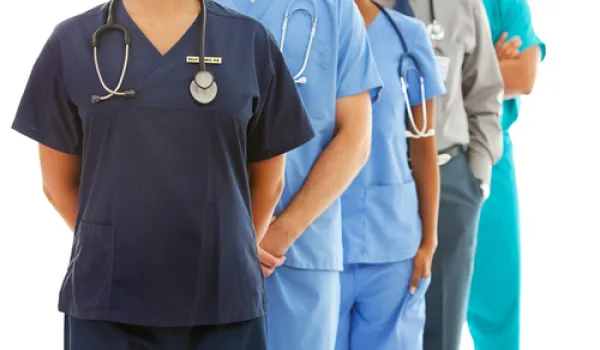 health professionals in scrubs stethoscopes