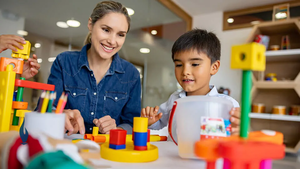 OTA working with boy in school