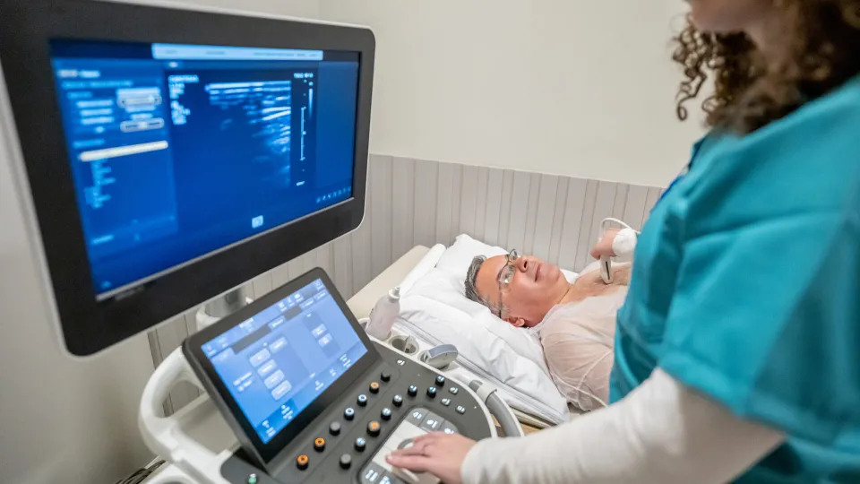 An elderly patient undergoes a contrast-enhanced ultrasound to detect potentially diseased areas of tissue.