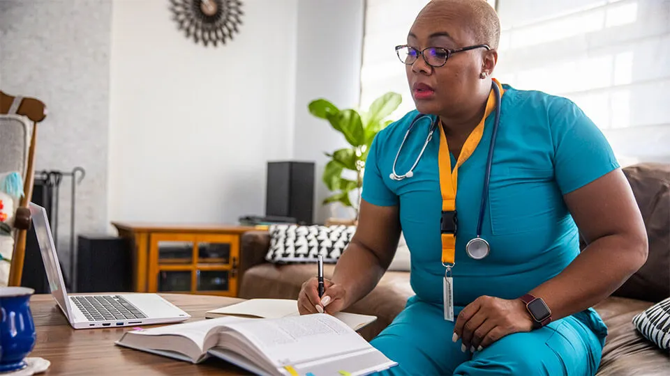 Nurse studying for NCLEX test requirements