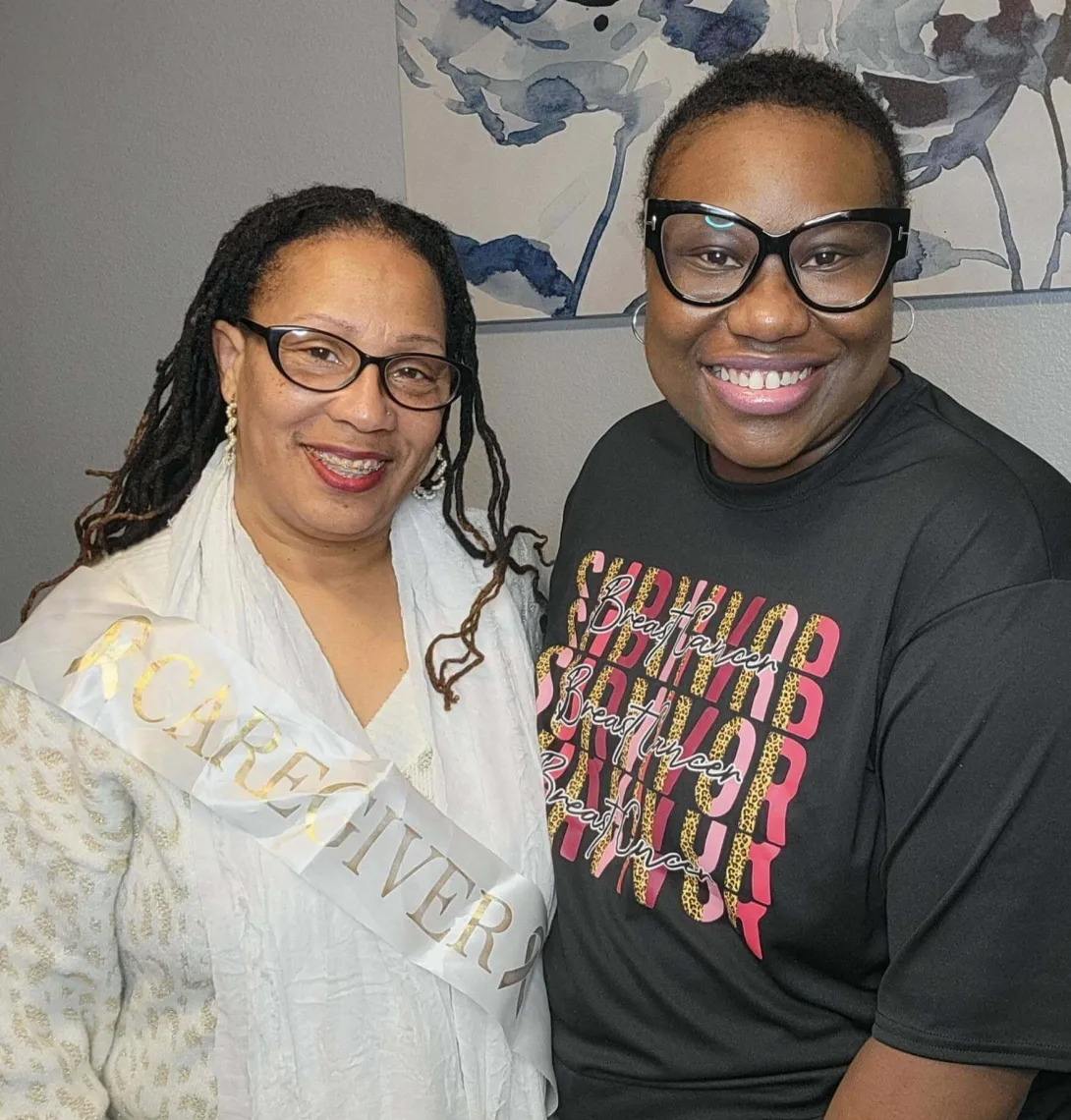 Chantel and her daughter-in-law standing side by side with big smiles.